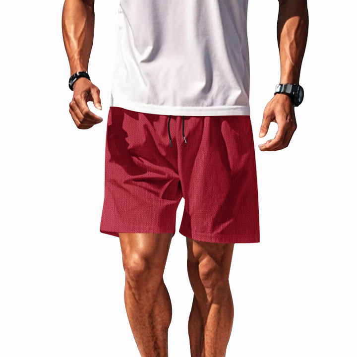 Men's two-layer swim shorts with integrated compression inner shorts and hidden cell phone pocket StylebySassy