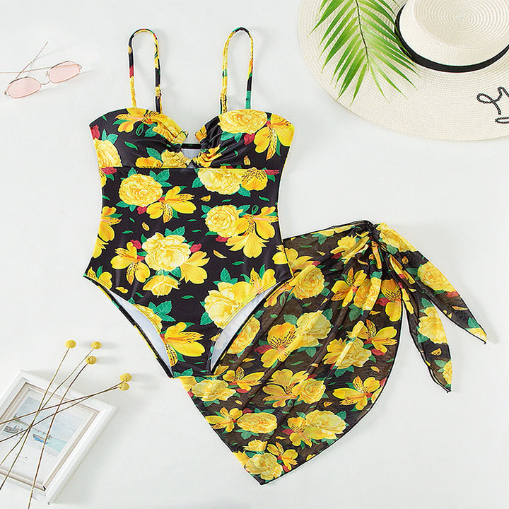 Women's one-piece swimsuit with floral design and matching overlay skirt StylebySassy