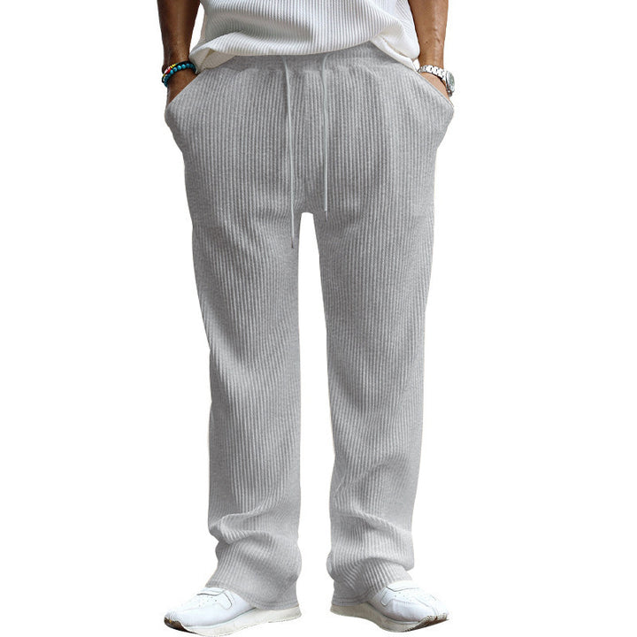 Men's straight cut corduroy velour pants with drawstring waistband, metal drawstring ends, and deep side pockets StylebySassy