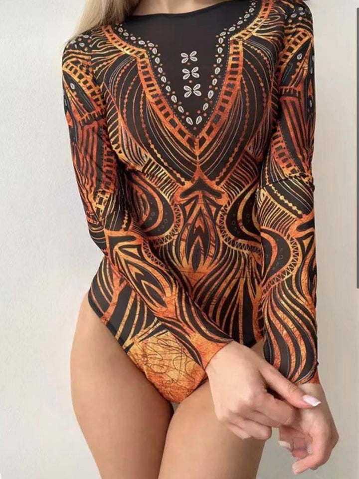 Women’s swimsuit with long sleeves and elegant floral design StylebySassy