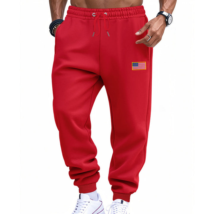 Men's slim-fit sweatpants with tapered leg, elastic drawstring waistband, and discreet flag application StylebySassy