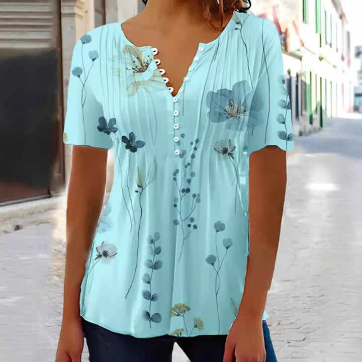 Women nan lightweight viscose tunic with decorative tuck pleats, half button placket and watercolor flower print StylebySassy