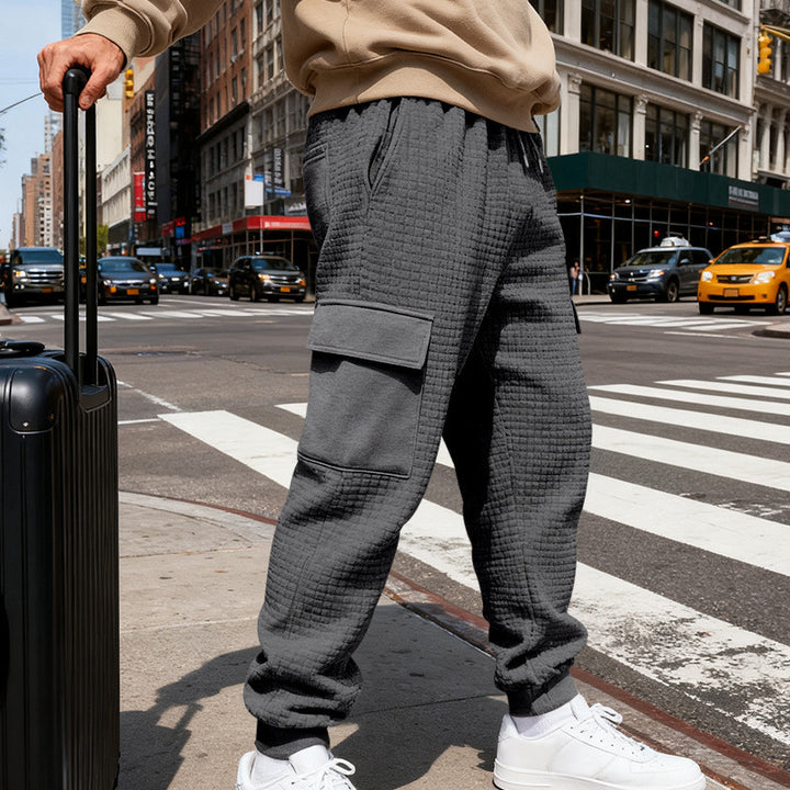 Men's waffle texture cargo pants in jogging style with flap pockets and elastic waistband StylebySassy