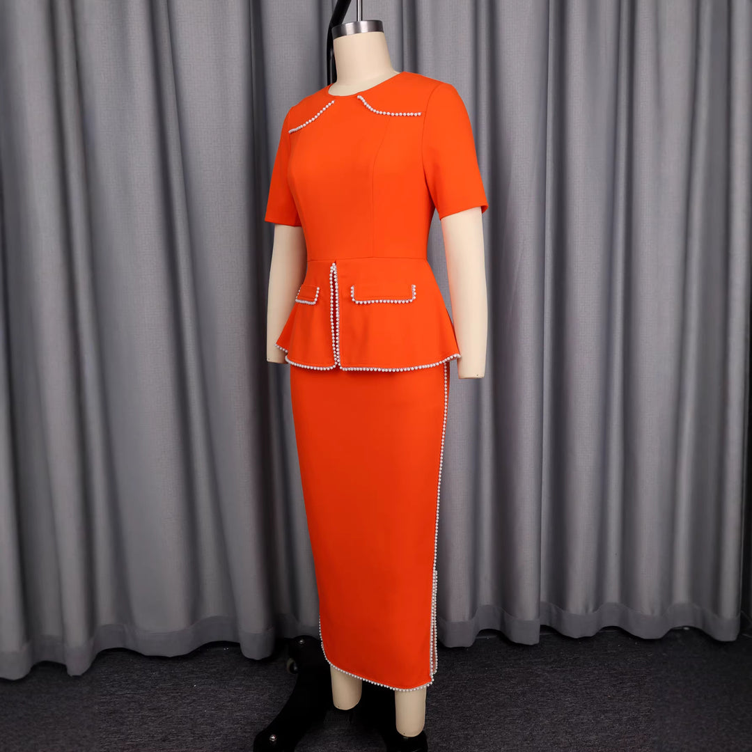 Women's elegant dress with decorative collar and pearl-embellished details StylebySassy