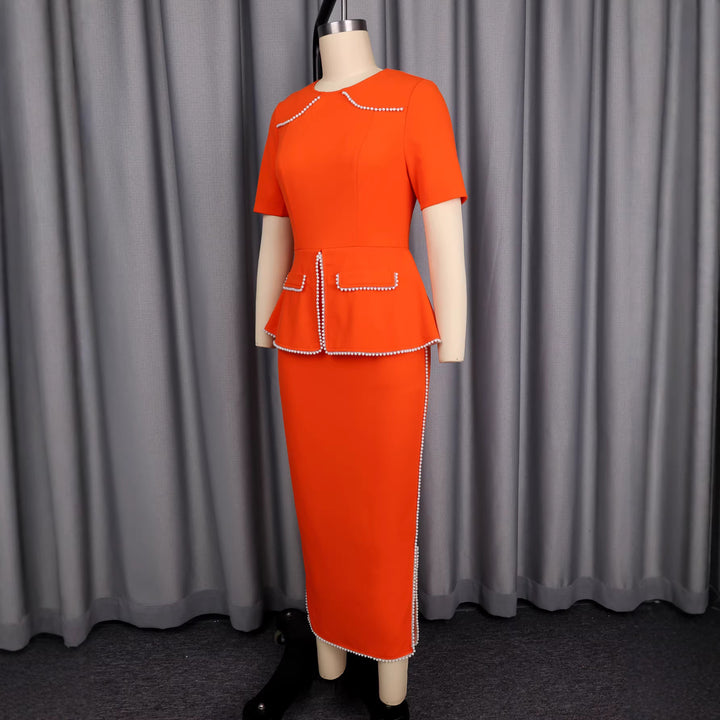 Women's elegant dress with decorative collar and pearl-embellished details StylebySassy
