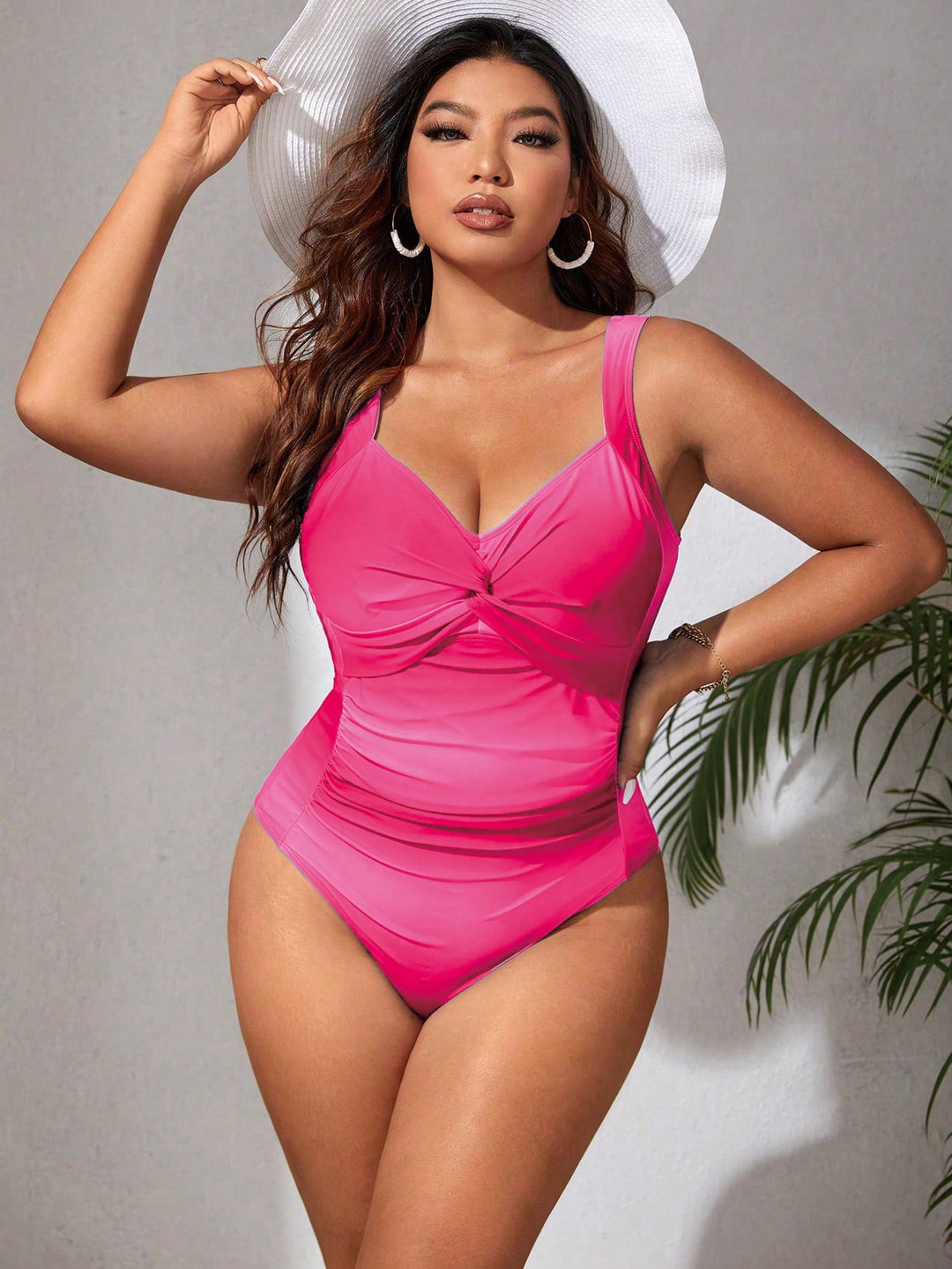 Ladies' one-piece swimsuit with fashionable wrap design StylebySassy