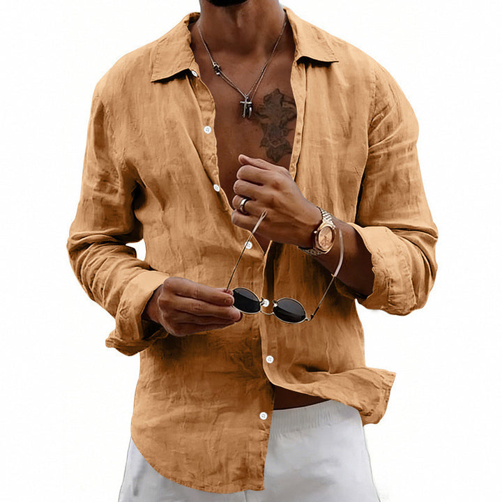 Men's airy relaxed linen shirt with open lapel, rounded hem, and roll-up sleeves StylebySassy