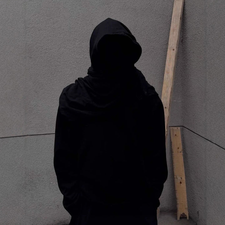 Unisex hooded pullover in usage marks style with attached tube scarf and frayed openings StylebySassy