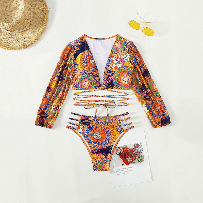 Women's bikini set with long-sleeved top and intricate cut-outs