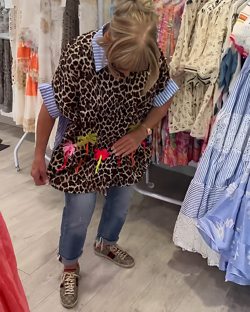 Women wide-cut poncho tunic with leopard print and decorative flamingo appliqués StylebySassy