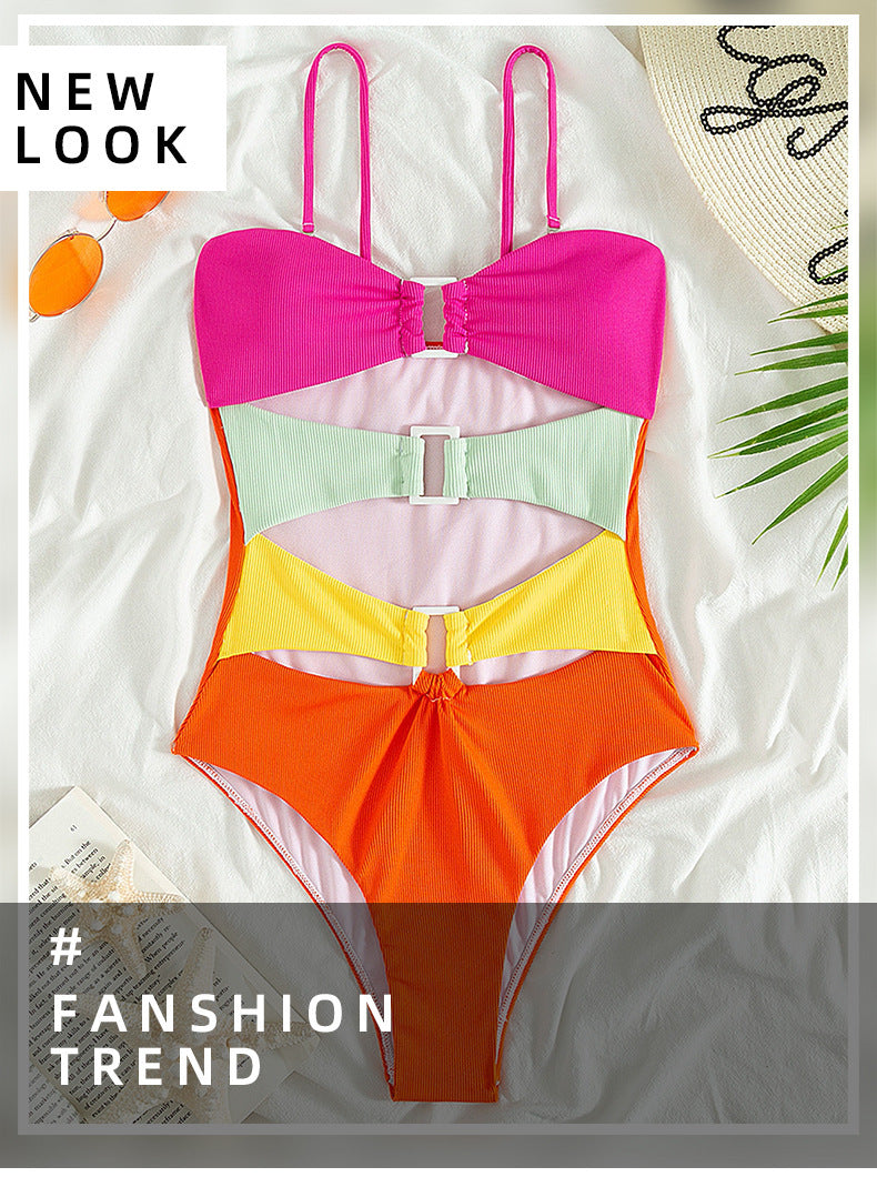 Women's one-piece swimsuit with colorful layered design and buckle StylebySassy