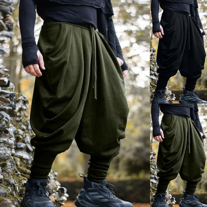 Men's avant-garde harem pants with wrap front, elastic waistband, and slim ankles StylebySassy