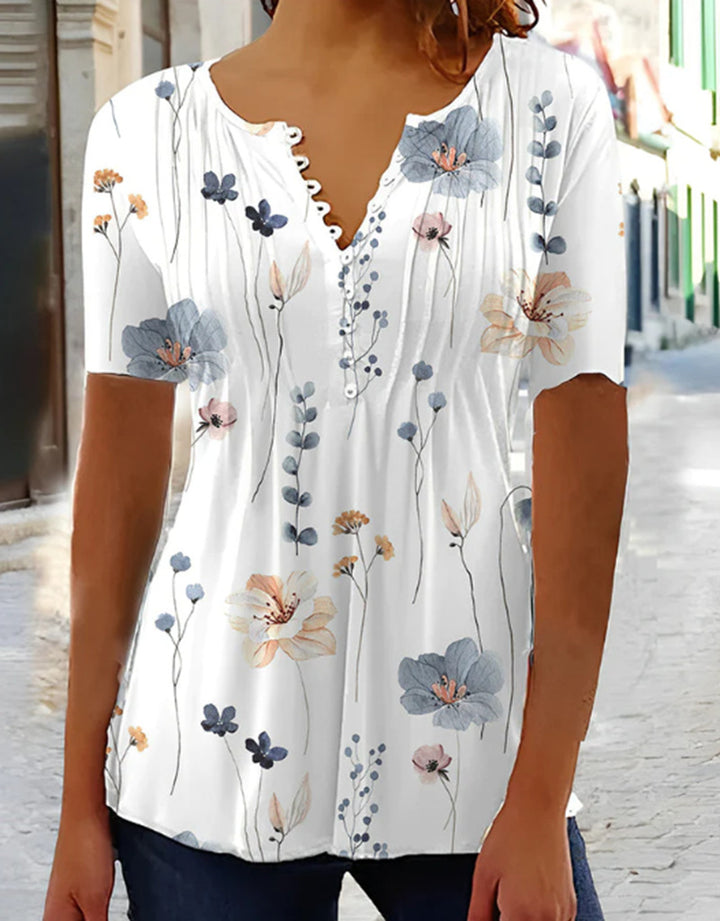Women nan lightweight viscose tunic with decorative tuck pleats, half button placket and watercolor flower print StylebySassy