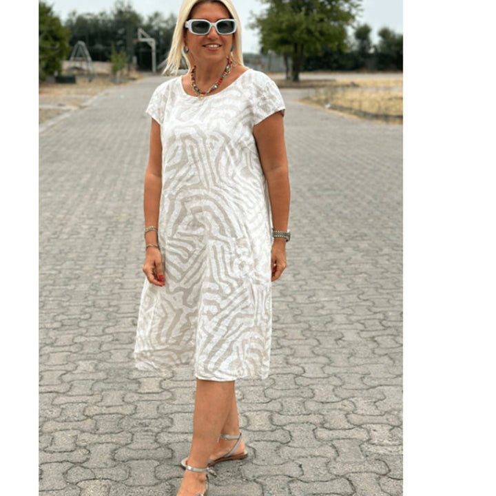 Women knee-length A-line midi dress with textured jacquard look and round neckline StylebySassy