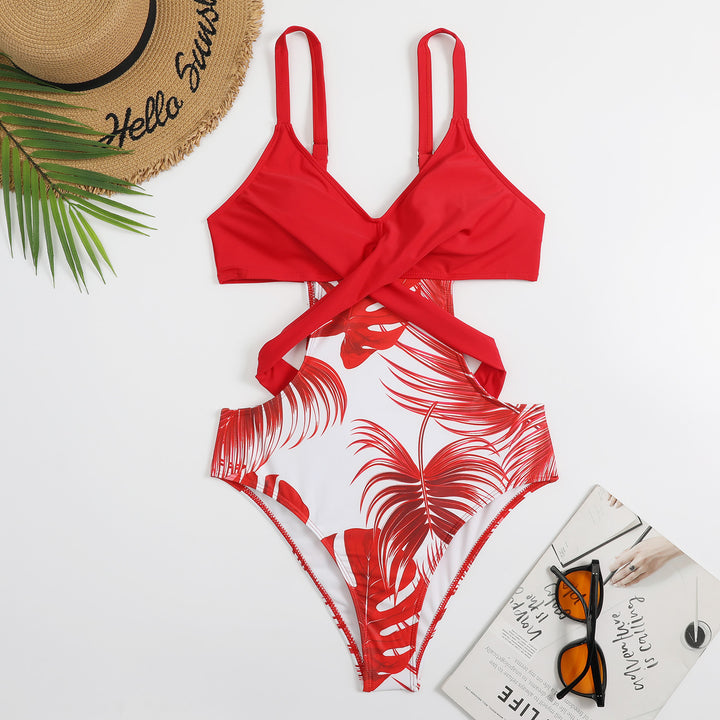 Women's one-piece swimsuit with fashionable cut-out and tropical leaf pattern StylebySassy
