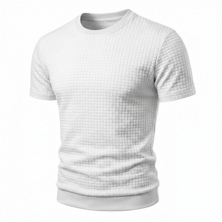 Men's short-sleeved knit shirt with embossed check structure, round neckline, and ribbed hem StylebySassy