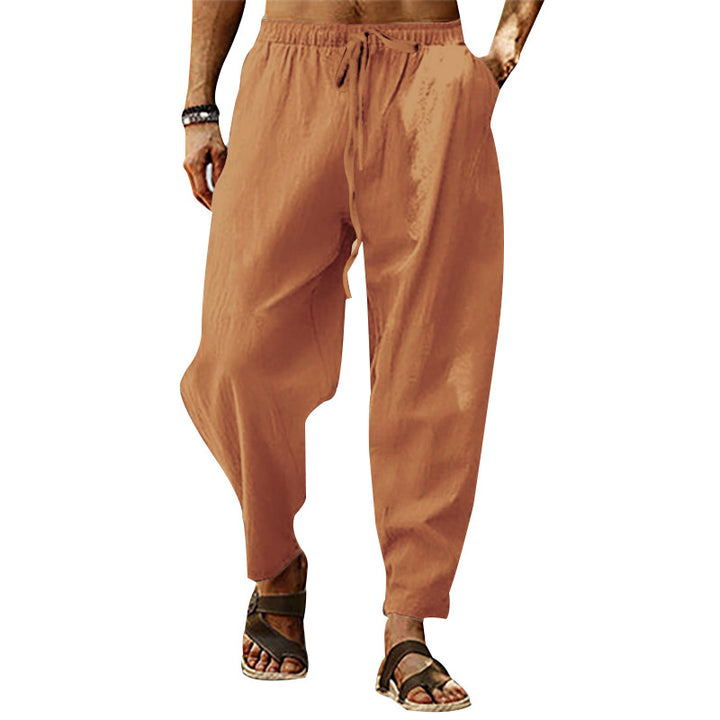 Men's relaxed summer slouch pants made of linen blend with elastic waistband and tapered ankle cuffs StylebySassy