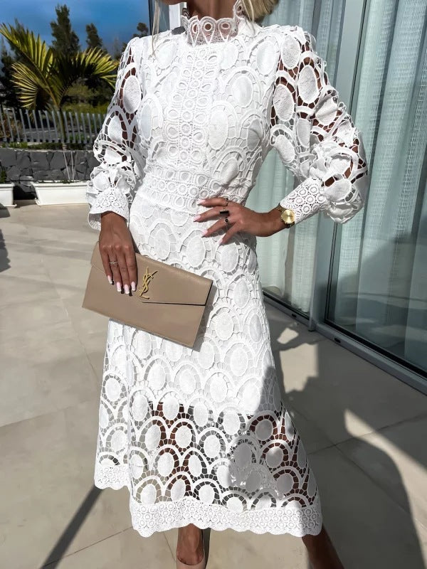 Women's crocheted midi dress with stand-up collar, transparent lace sleeves, and fitted A-line StylebySassy