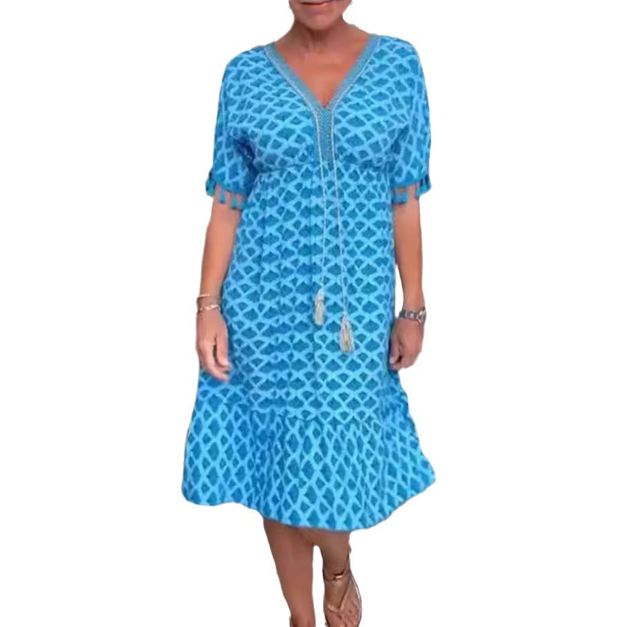 Women's casual V-neck beach dress with tassel tie and ruffle skirt StylebySassy