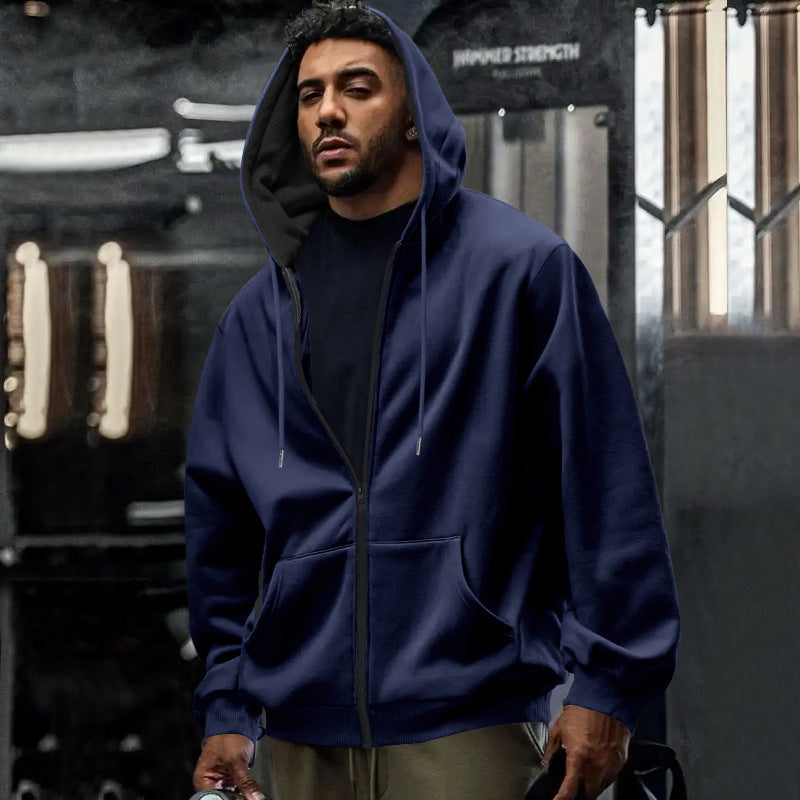 Men's oversized zip-up hoodie with kangaroo pockets and contrasting inner lining StylebySassy