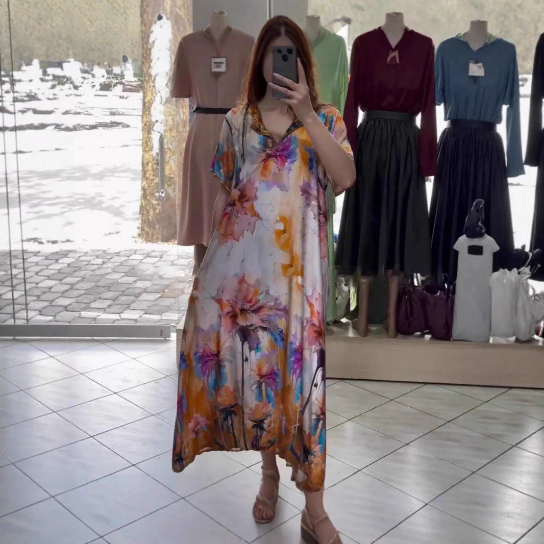 Women flowing maxi kaftan dress with V-neck and large watercolor floral print StylebySassy