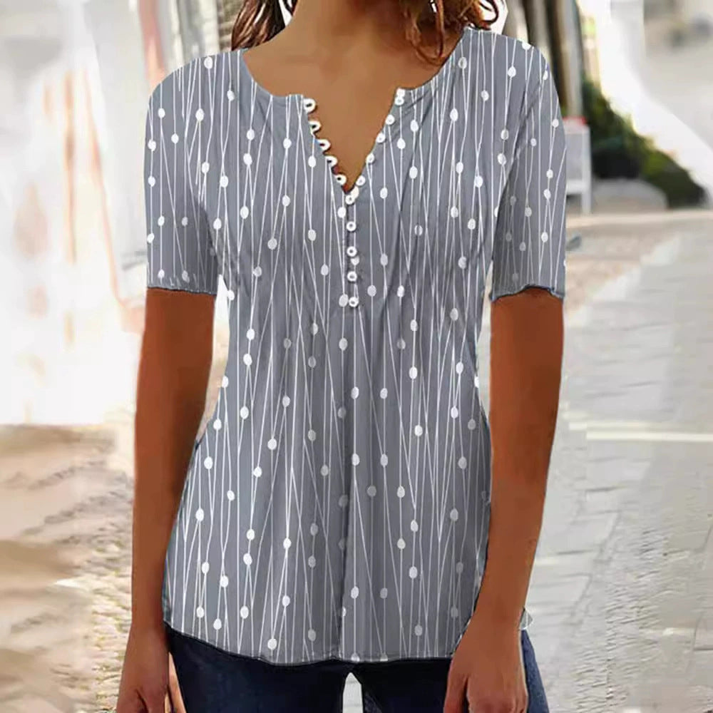 Women's lightweight tunic blouse with V-neck, decorative button placket, and empire gathering StylebySassy