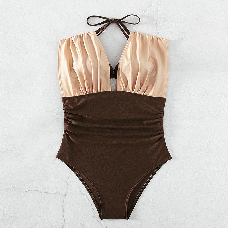 Women’s one-piece swimsuit with unique V-neckline and chic wrap detail StylebySassy