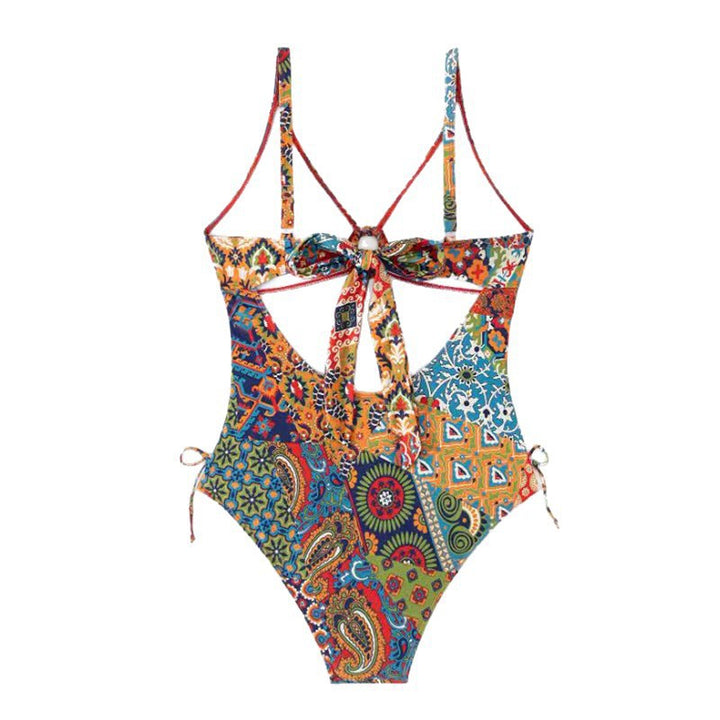 Ladies' one-piece swimsuit with playful floral pattern StylebySassy