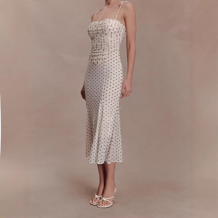 Women's midi party dress with ruffle details and transparent fabric structure StylebySassy