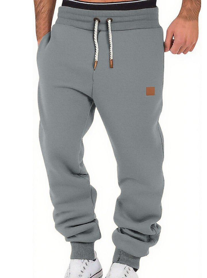 Men's comfortable jogging pants made of high-quality cotton blend with elastic waistband, drawstring, and cuffs StylebySassy