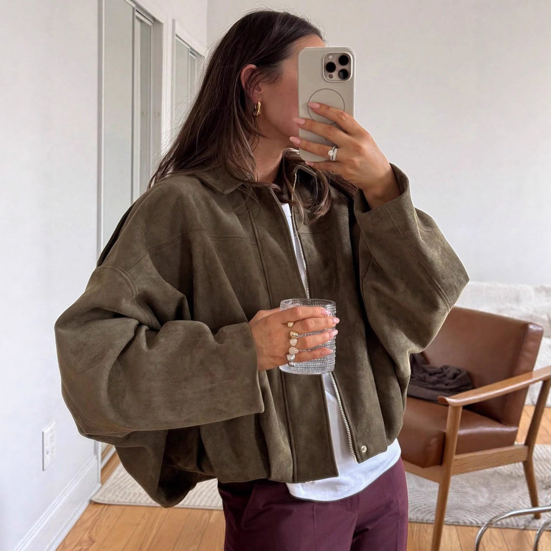 Women's loose short jacket with balloon hem, concealed closure and shoulder flaps StylebySassy