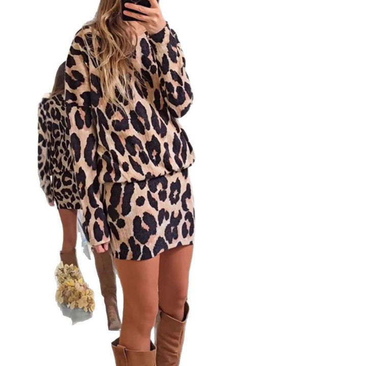 Women's cozy knitted two-piece set with loose round neck sweater and high-waisted mini skirt in animal print StylebySassy