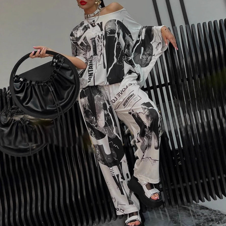 Ladies two-piece wide satin leisure set with off-shoulder batwing top and palazzo pants StylebySassy
