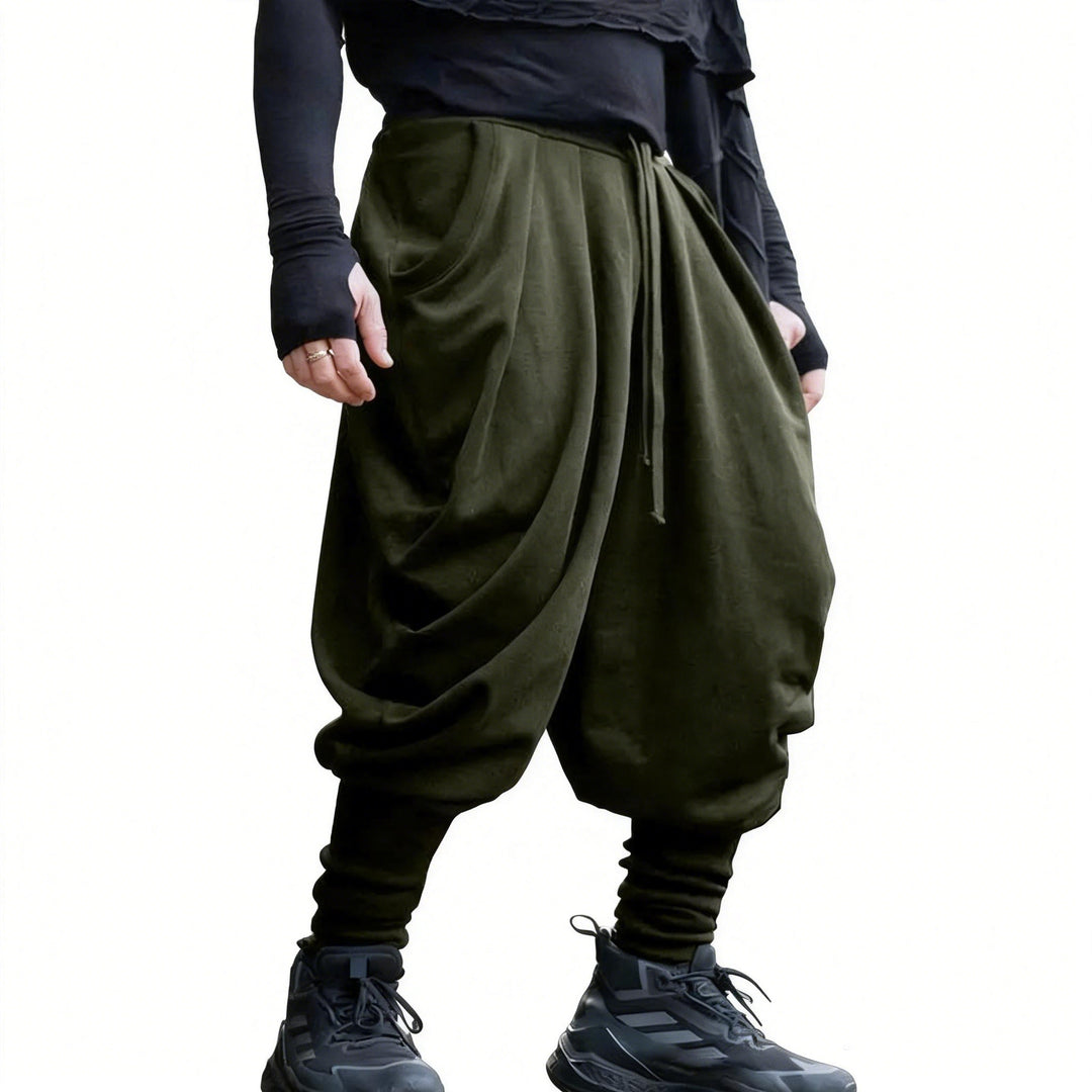 Men's avant-garde harem pants with wrap front, elastic waistband, and slim ankles StylebySassy