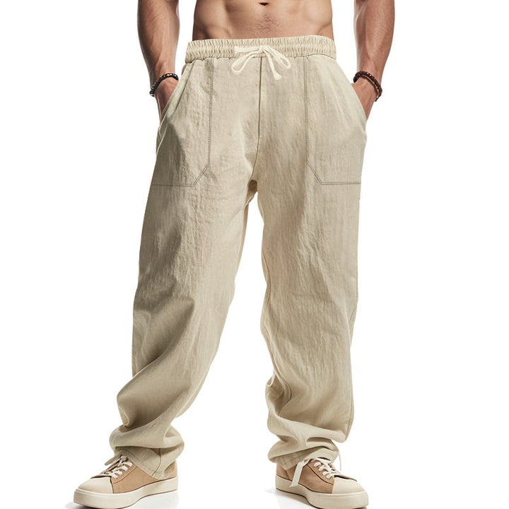 Men's casual linen trousers with elastic waistband, drawstring, and large side pockets StylebySassy