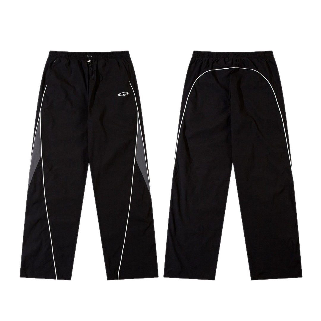 Men's sporty jogging pants with elastic waistband, side contrast piping, and straight cut StylebySassy