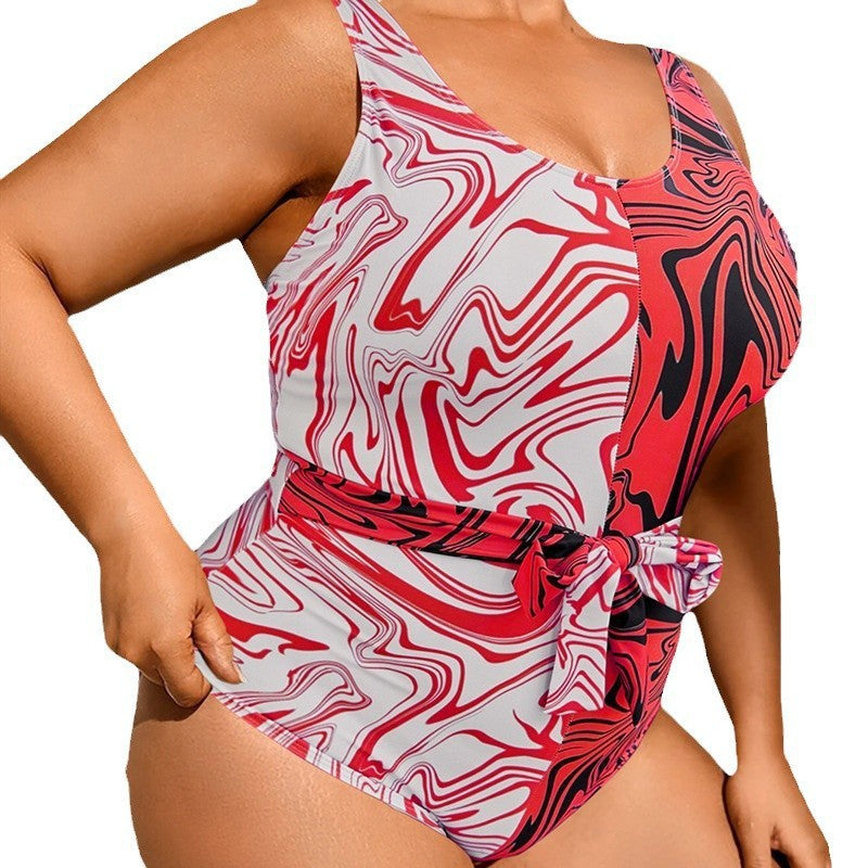 Women's one-piece swimsuit with modern marble pattern and waist-cinching belt StylebySassy