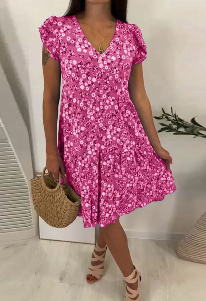 Ladies' V-neck tiered dress with puff sleeves and fitted underbust seam StylebySassy