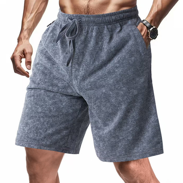 Men's lightly fitted terry shorts with elastic waistband, drawstring and side pockets StylebySassy