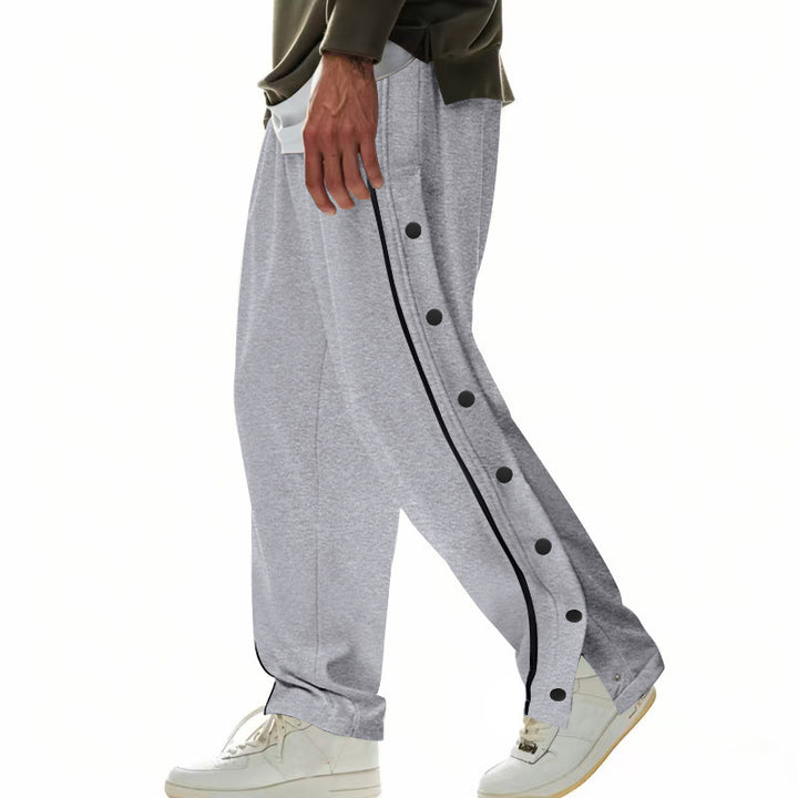 Men's wide training pants with side snap button placket, contrast stripes, elastic waistband, and straight leg StylebySassy