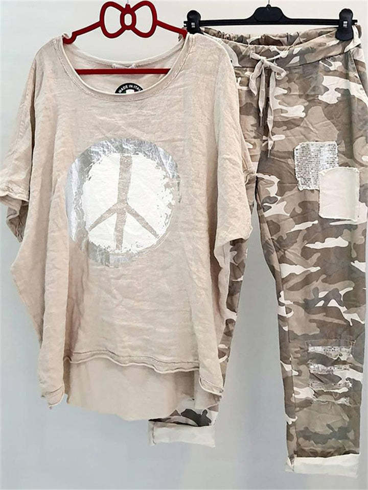 Women’s casual leisure two-piece with wide-cut linen look shirt, peace symbol and camouflage jog pants with patch details StylebySassy
