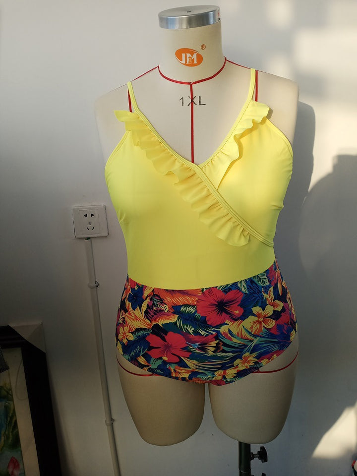 Women's one-piece swimsuit with asymmetrical ruffle design and floral pant area StylebySassy