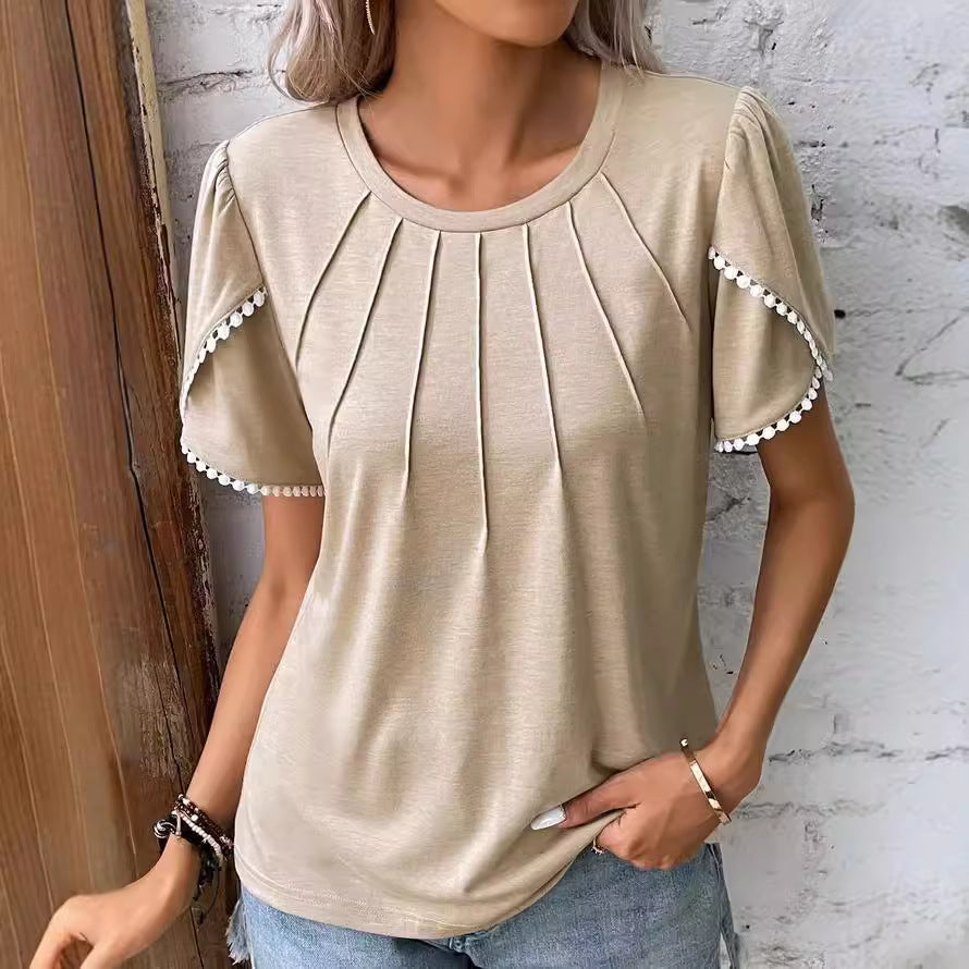 Women's round neck shirt with decorative pleated front, flutter sleeves and pompom trim StylebySassy