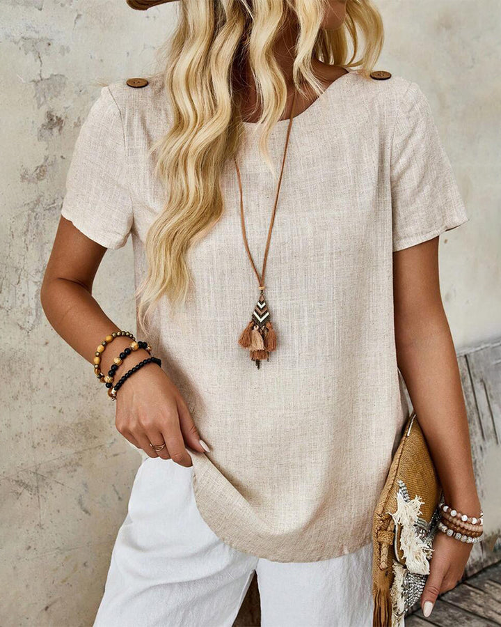 Women's cropped short-sleeve linen-look top with round neck, shoulder button placket, and rounded hem StylebySassy