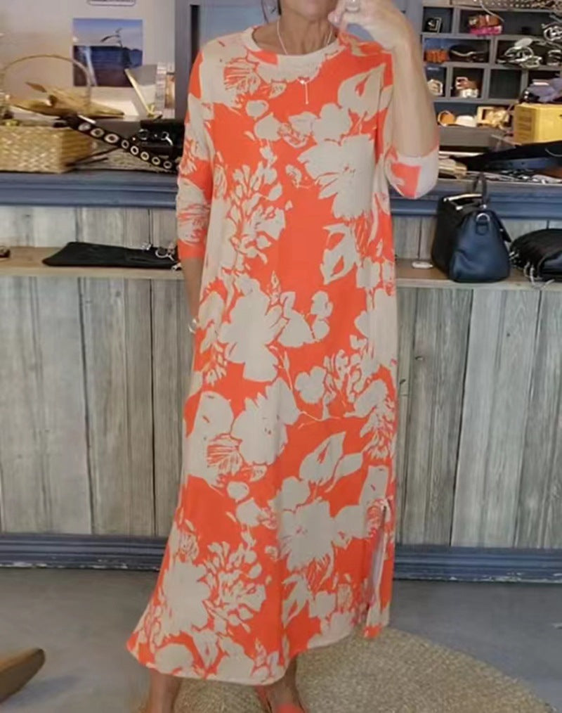 Women’s flowing A-line maxi dress with three-quarter sleeves round neckline side slit and inserted pockets StylebySassy