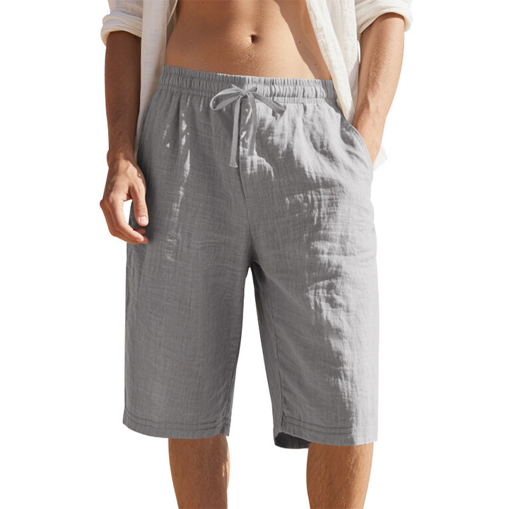 Men's knee-length Bermuda shorts made of crinkled muslin with elastic tunnel drawstring waistband and side pockets StylebySassy