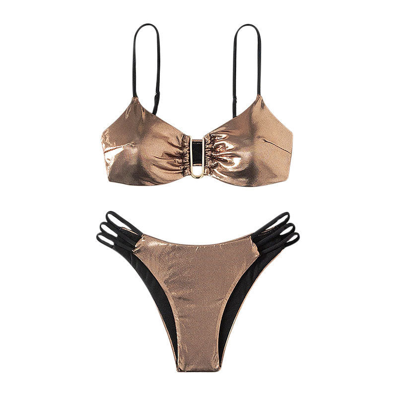 Women's bikini set with intricate lace-up look and golden accents StylebySassy