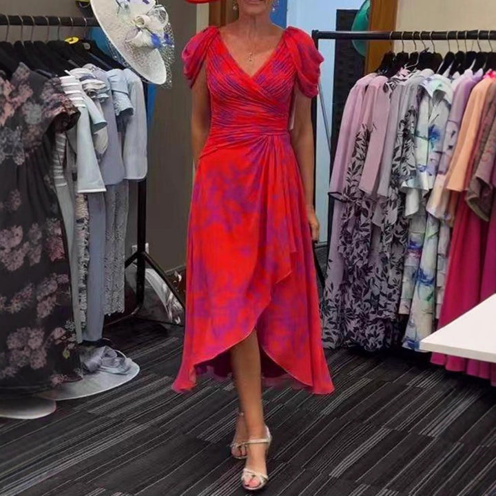 Women's wrap midi dress with ruched bodice, puff sleeves, and asymmetric waterfall hem StylebySassy