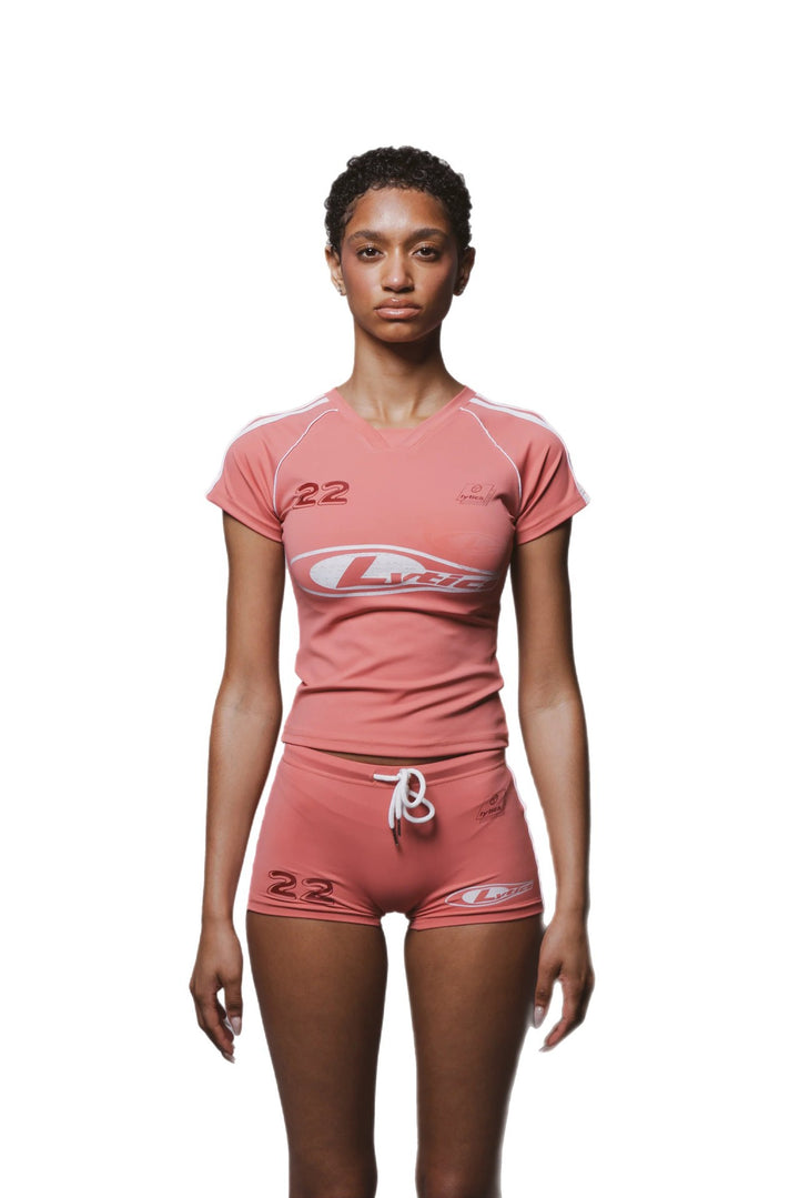 Women's sports set with body-hugging shorts and short-sleeved top StylebySassy