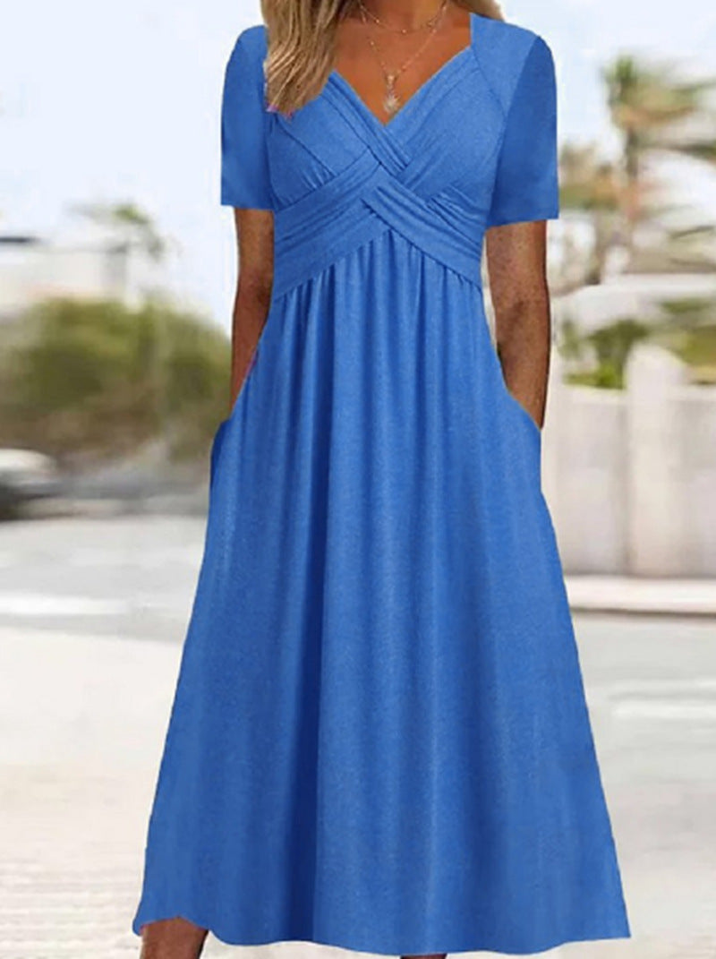 Women's flowing maxi dress with crossed yoke V-neck short sleeves and side pockets StylebySassy